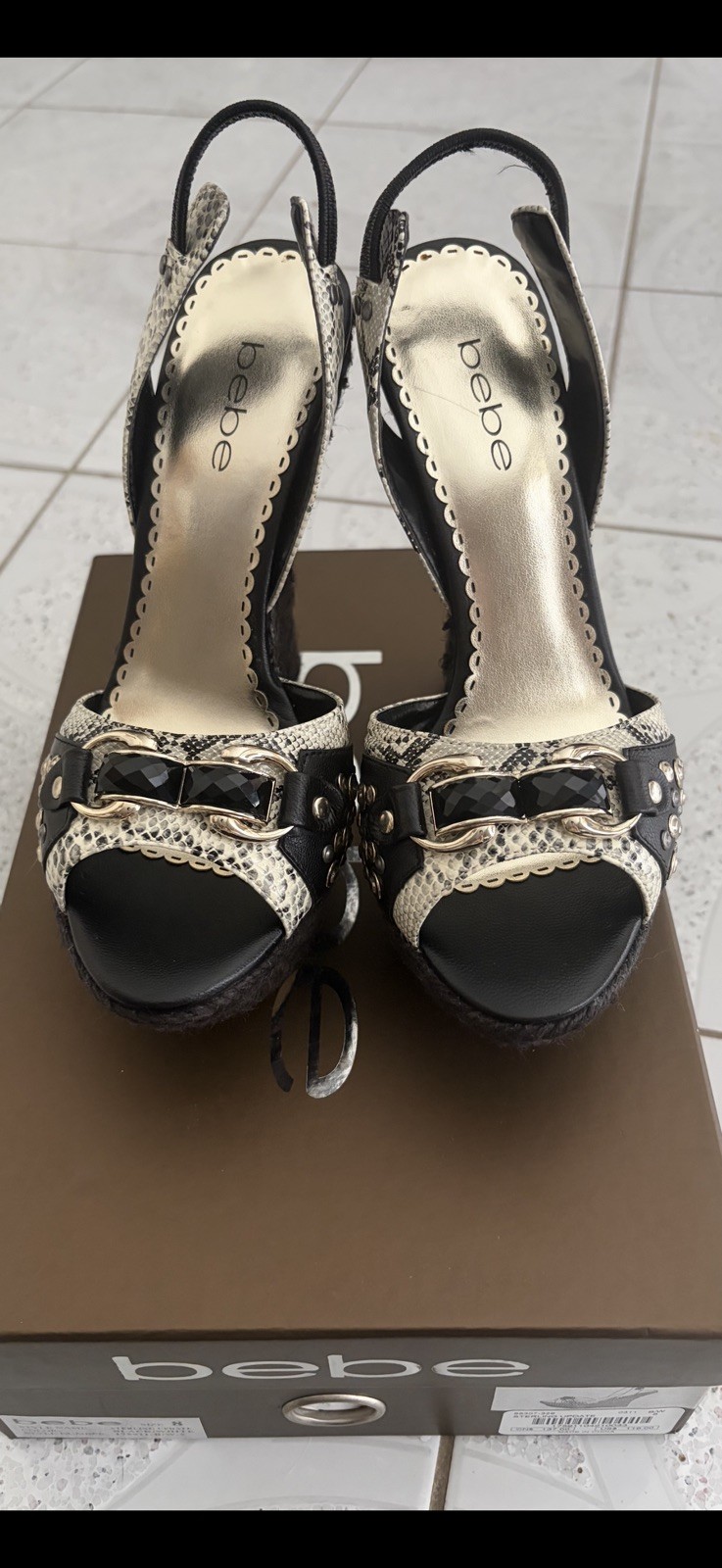 Bebe “Sterling Update” Black/White wedge sandal. Size 8. Brand new. Beautiful!!