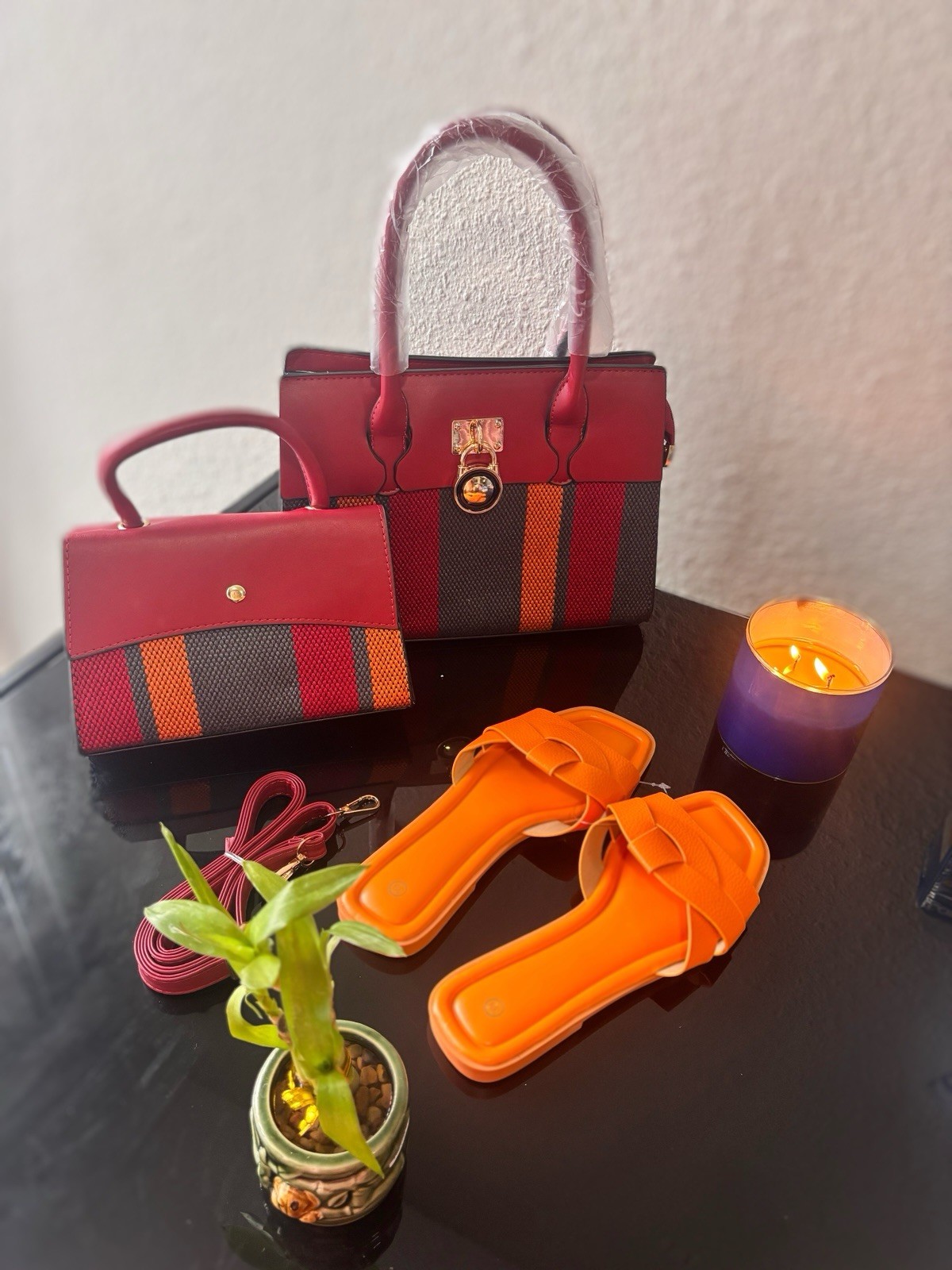 New women’s handbags and flat sandals. Available separately or as a set.