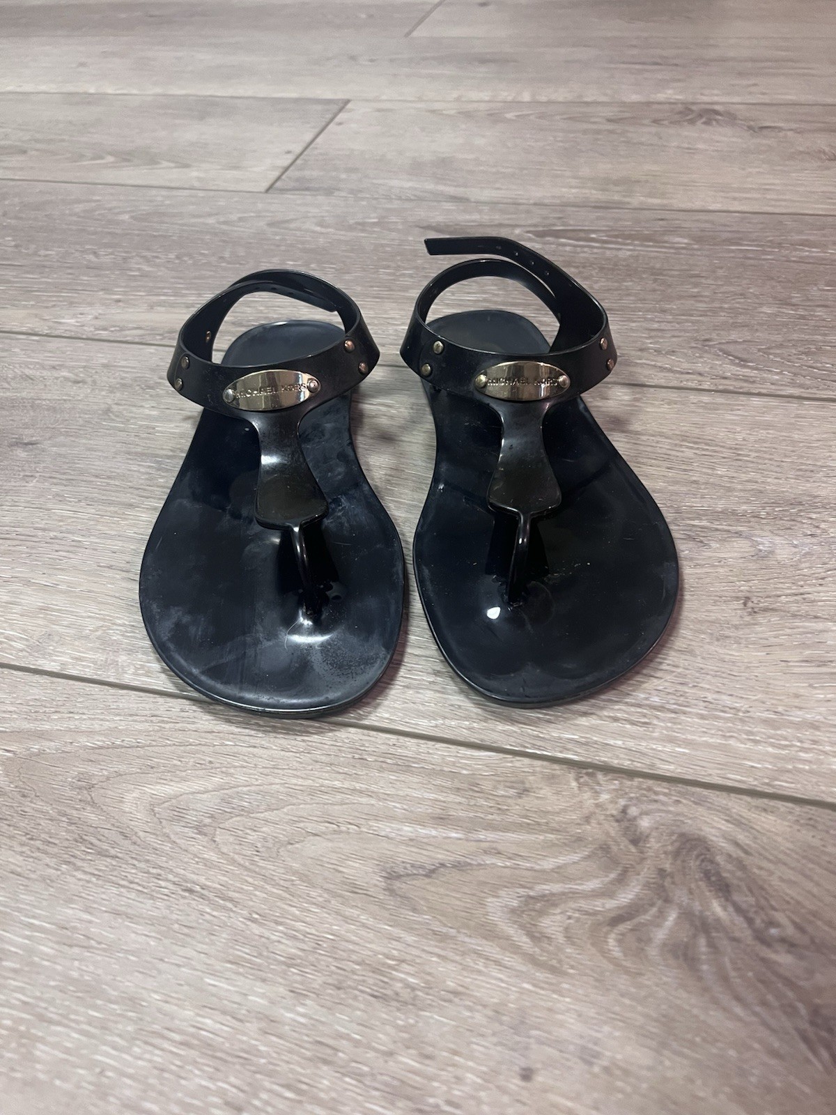 Women Michael Kors MK Plate Jelly Flat Buckle Up Sandals Black Size 9