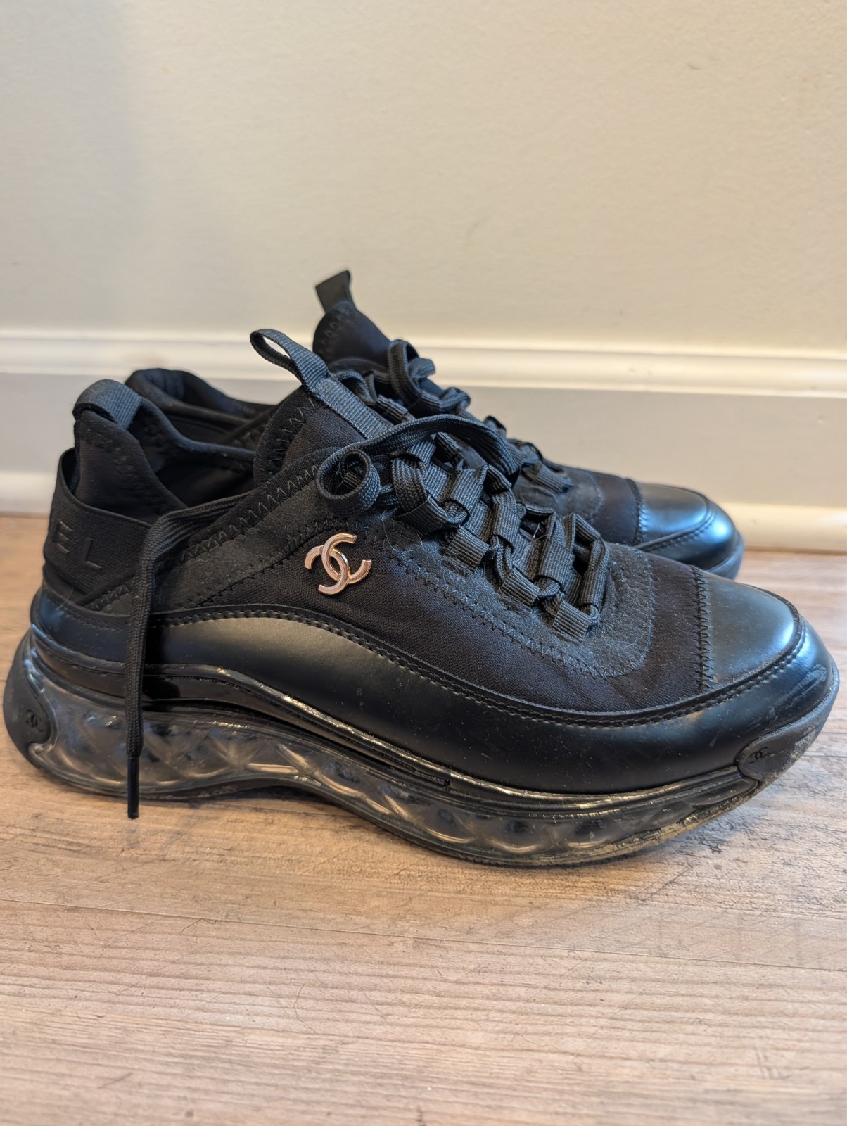 chanel lace up all black sneakers
