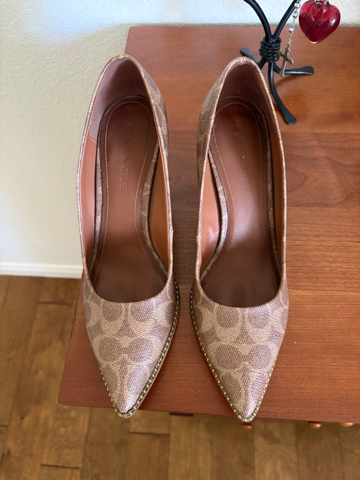 coach heels 8 good condition very classy and elegant color brown