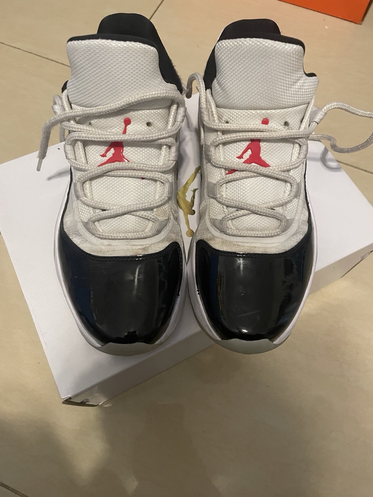 Jordan WMNS Air Jordan 11 CMFT Low White/Black/Red Blue Tint DV2629-106 2023