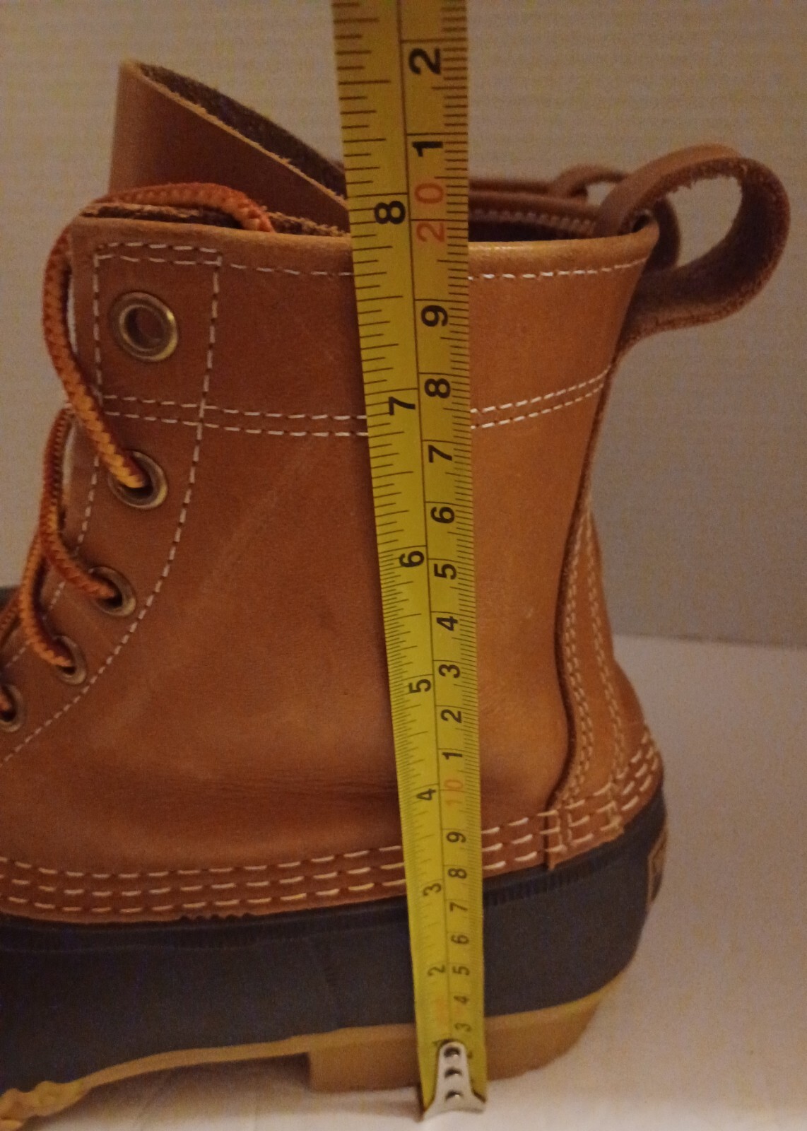 L.L. Bean Boots Duck Boots Feature A Lace Up Closure With Pull Tab On Back.