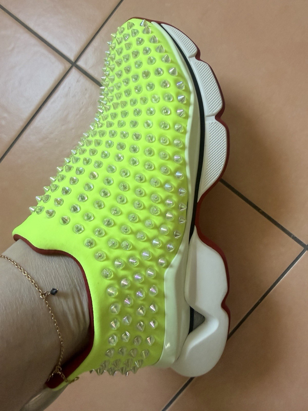 STUNNING CHRISTIAN LOUBOUTIN SPIKE SOCK ,slip-on sneakers in vibrant neon yellow