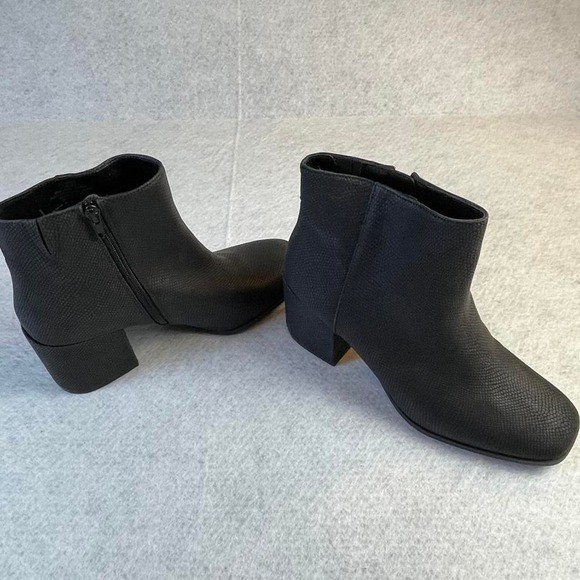 Black ankle boots with textured reptile skin pattern, size US 10M