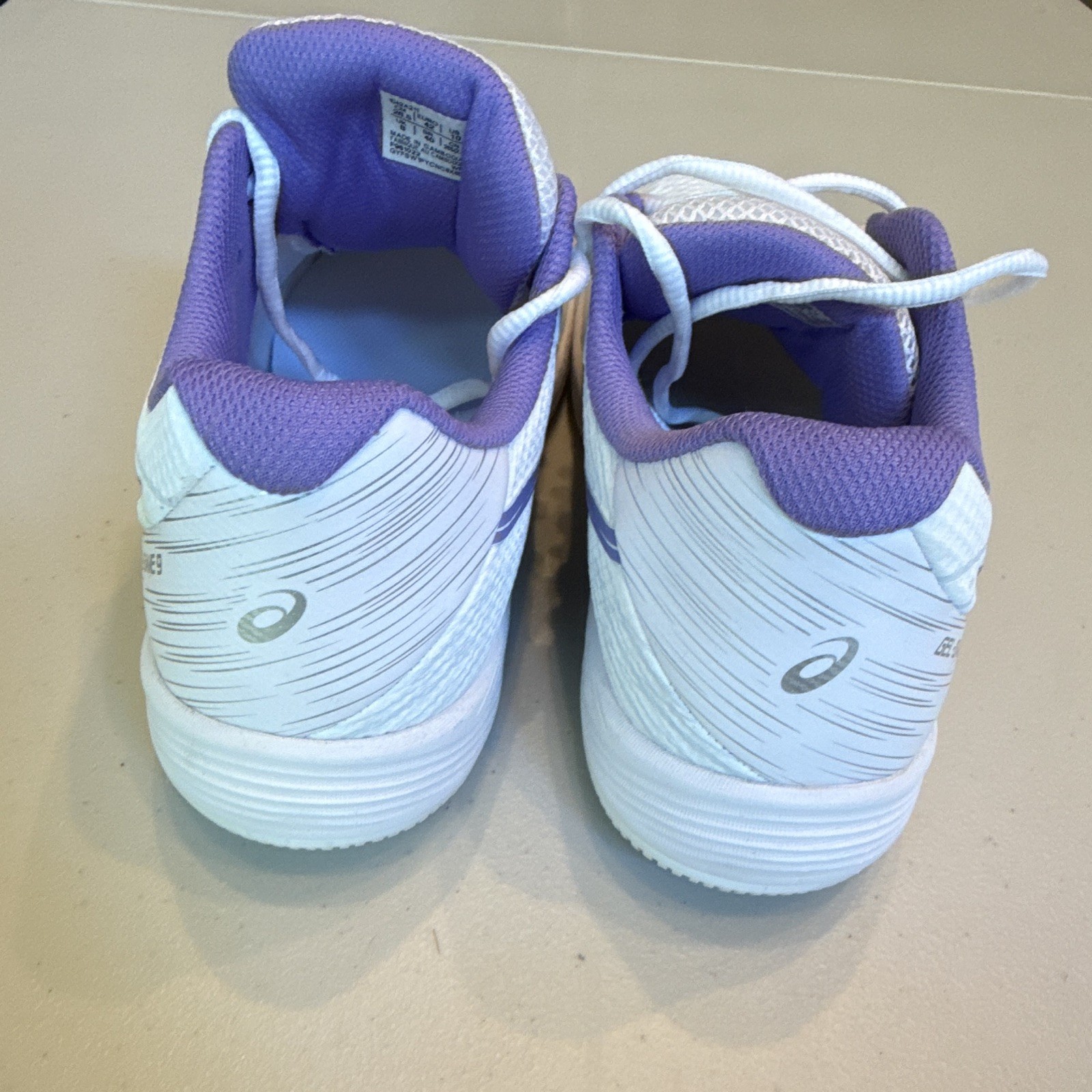 ASICS Women’s Low Top Lace Up Athletic Sneaker White/Purple Solid 1042A211