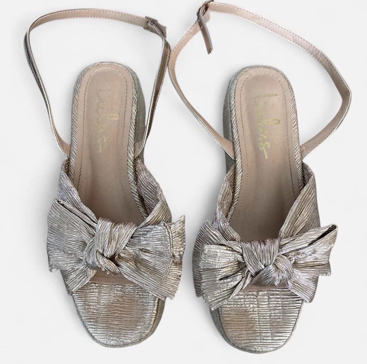 Lulus Rose Gold metallic bow wedge heels with crinkled texture