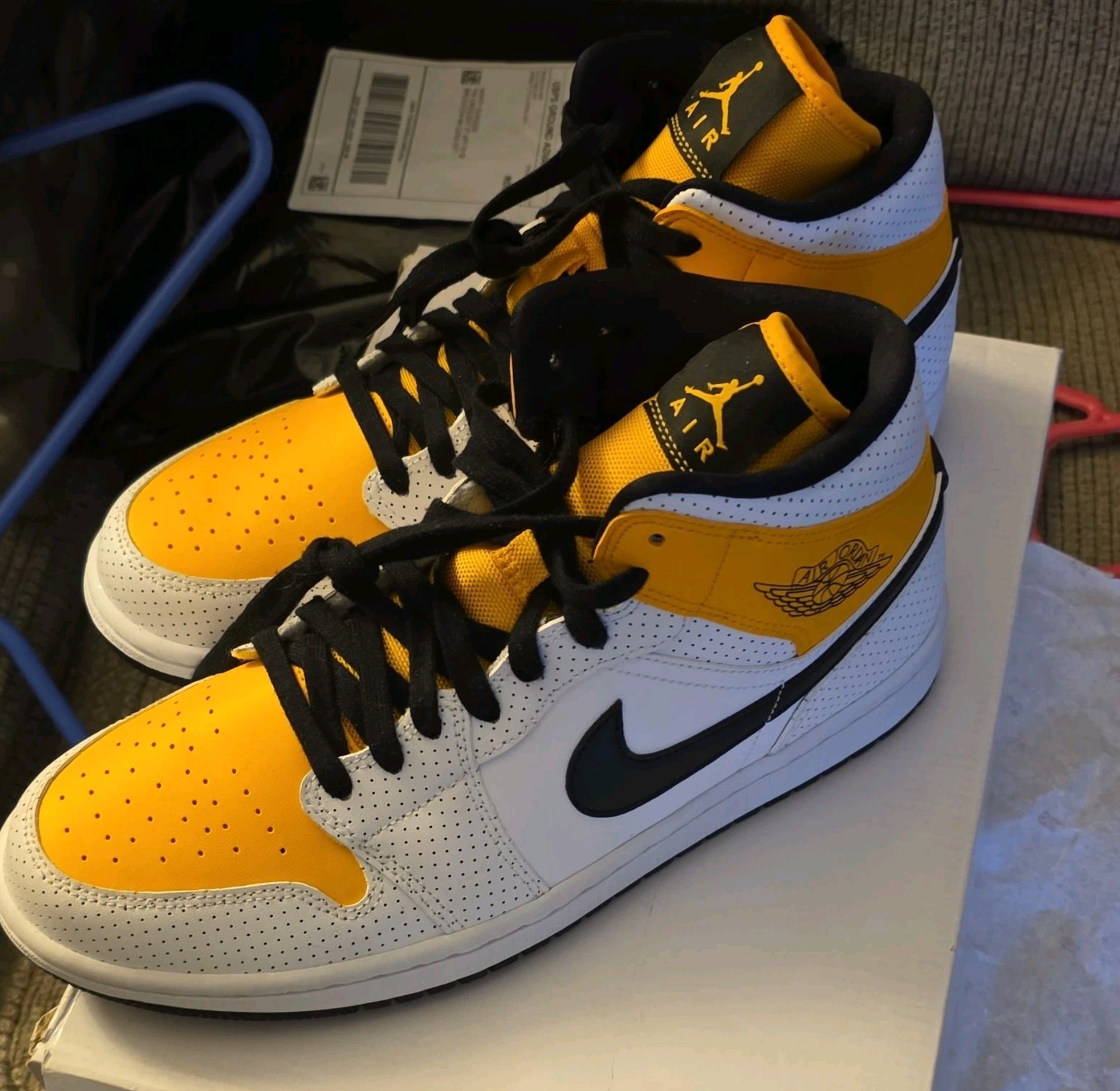 Jordan Air Jordan 1 Mid White Black University Gold Women’s Sneaker
