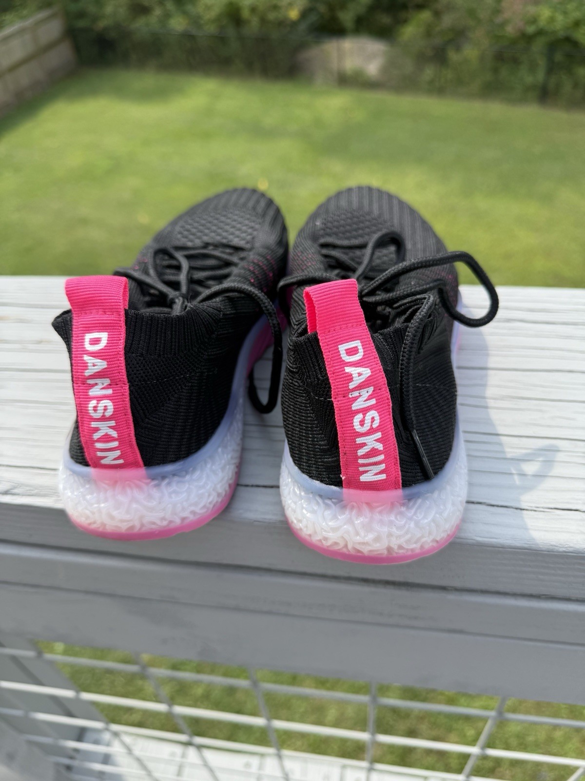 Danskin Positive lace-up sneaker with two toned upper and contrast trim.