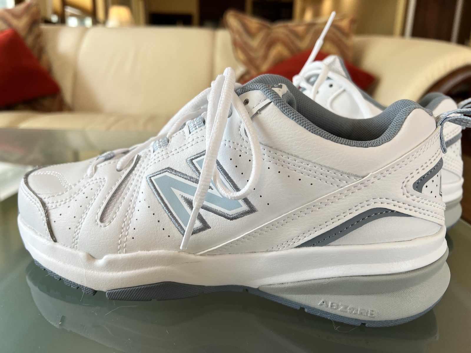 Preowned New Balance 608 size 8M White walking sneakers. Worn 3 times!