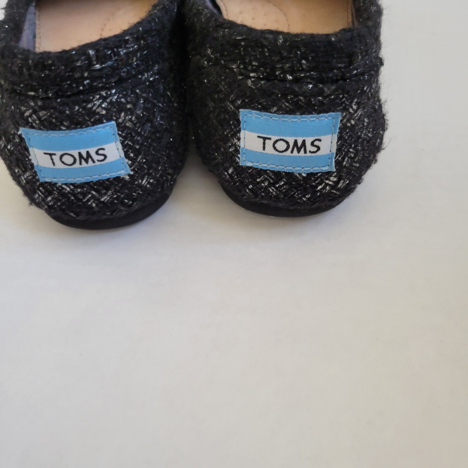 Tom’s Slip Ons Black and Silver Glitter flats Ladies Size 6.5
