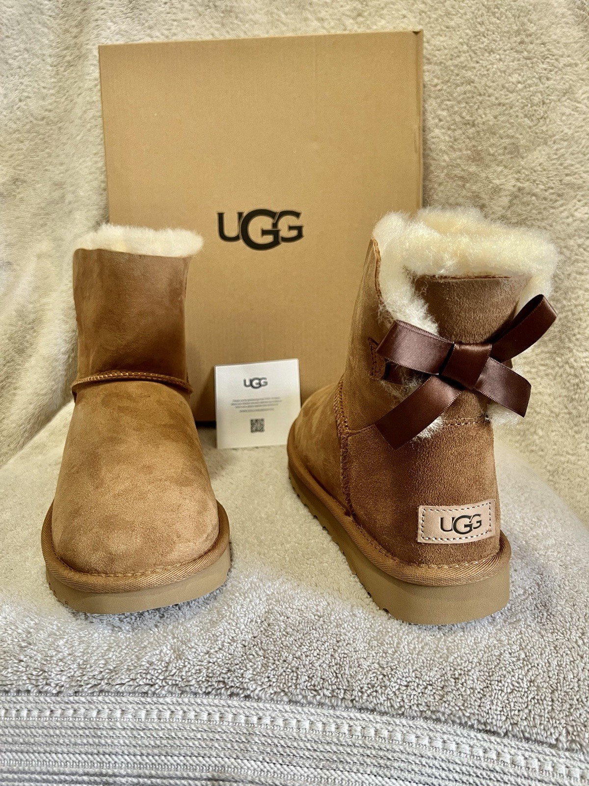 UGG Women’s Mini Bailey Bow II Suede Sheepskin Lined Pull-On Ankle Bootie 7