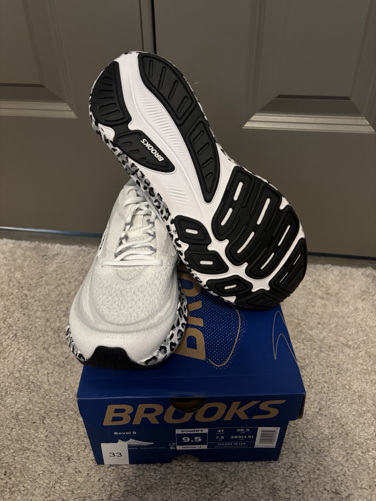Brooks Revel 9 Low Top Lace Up Athletic Sneaker White/Black Rubber Outsole