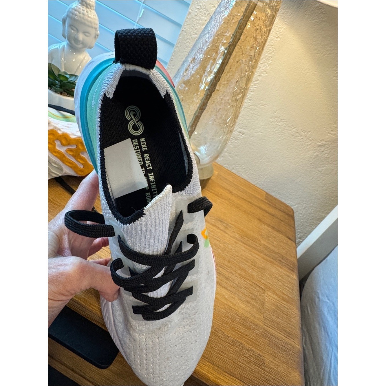Nike React Infinity White Athletic Sneakers with Teal, Yellow & Red Accents