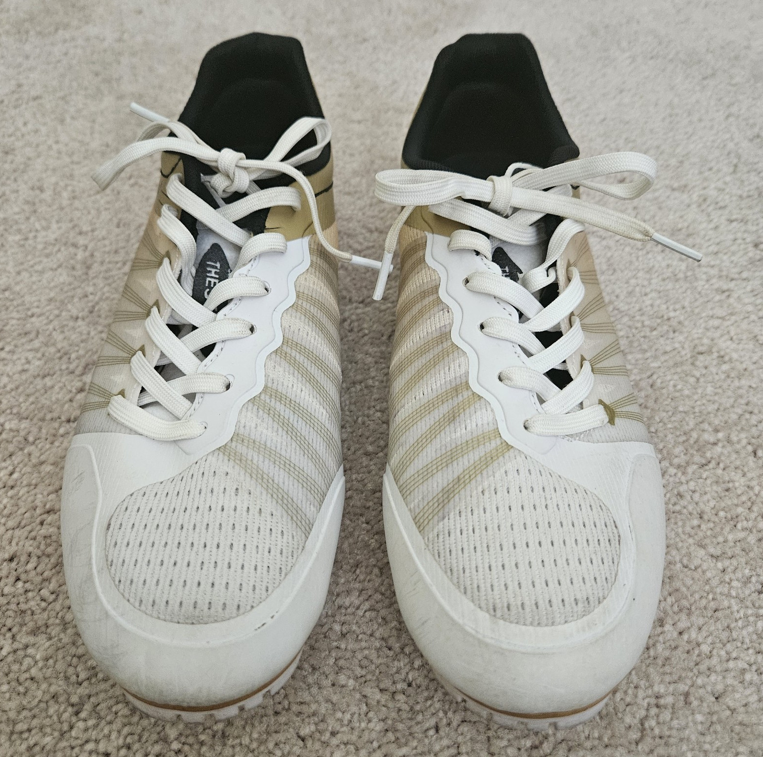 Track Spikes with extra spikes, wrench, and drawstring bag.