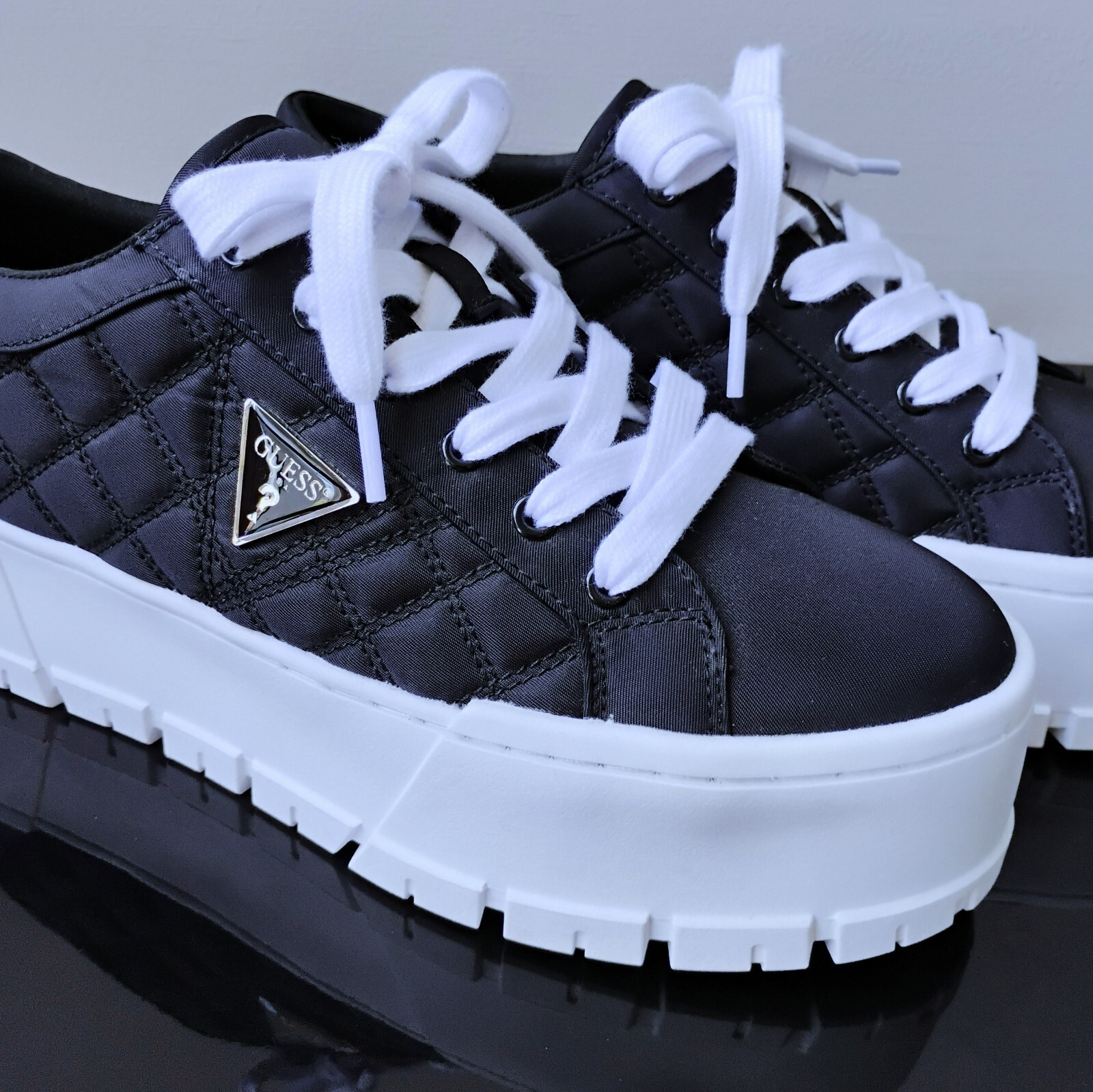 Guess Women’s Tesie Quilted Platform Sneaker in Sophisticated Black Beauty Color