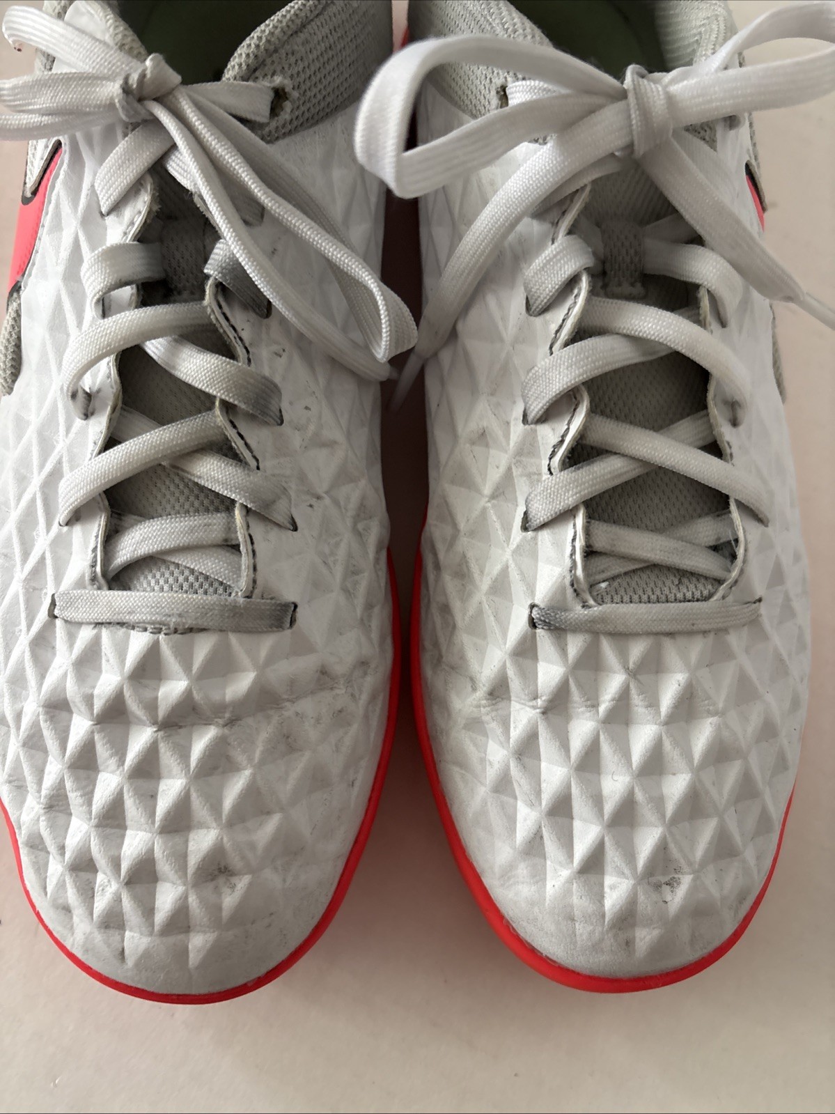 Pink and White Nike Tiempo legend running shoes Women’s Size 7