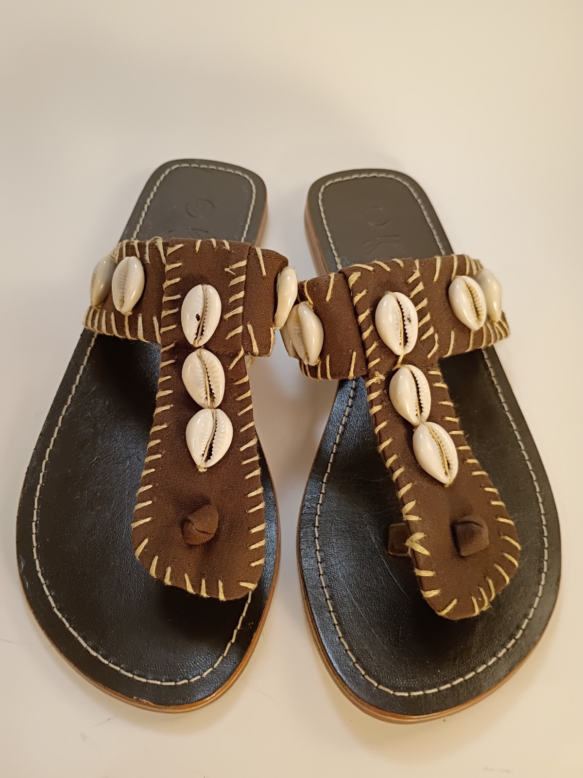 WHITE MOUNTAIN Cowrie Shell Maasai Brown Stiched Fabric & Leather Thong Sandals