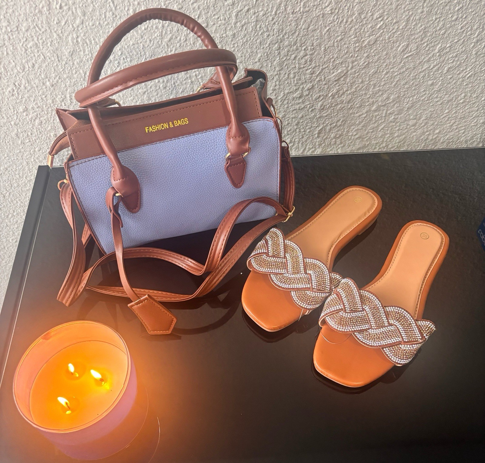 New women’s handbags and flat sandals. Available separately or as a set.
