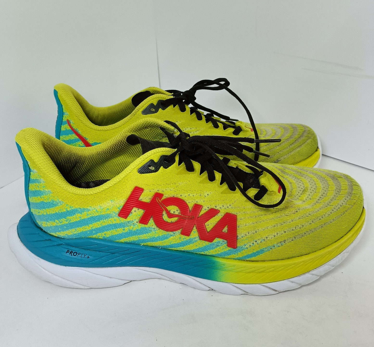HOKA ONE ONE Mach 5 Women’s Lace Up Low Top Running Sneakers Yellow Blue Red
