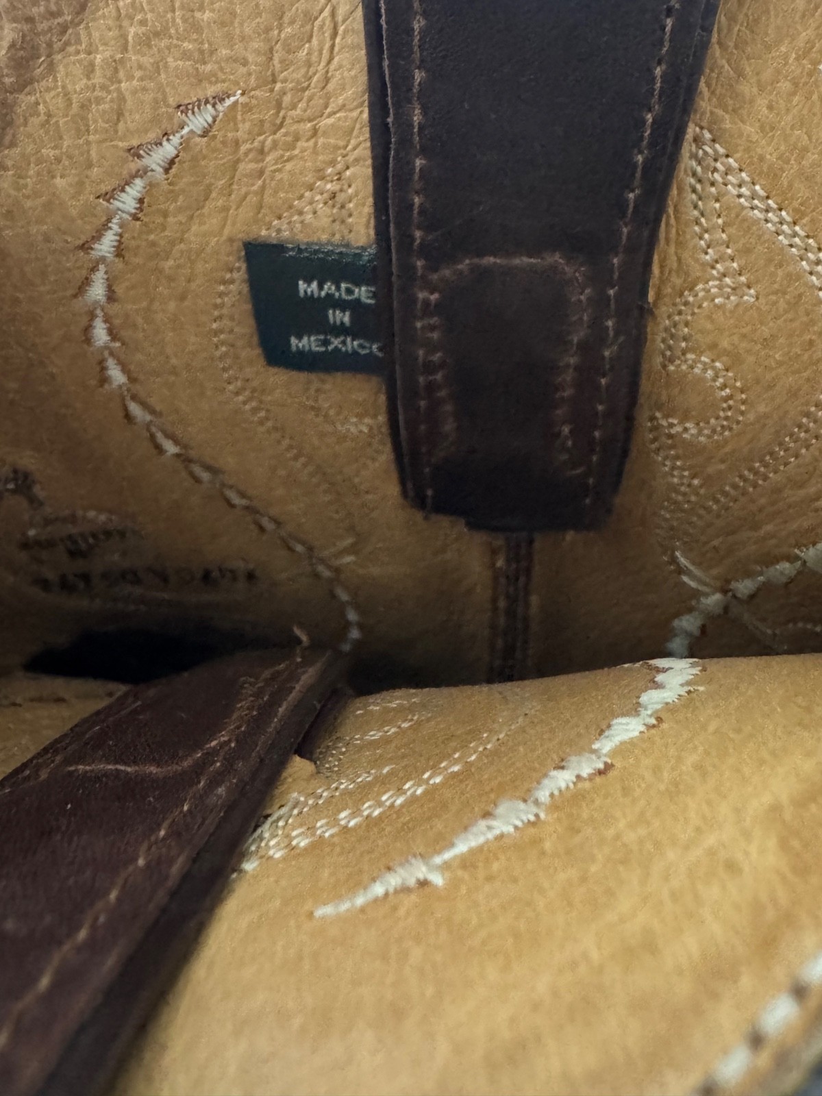 Woman’s brown leather cowboy boots size 7