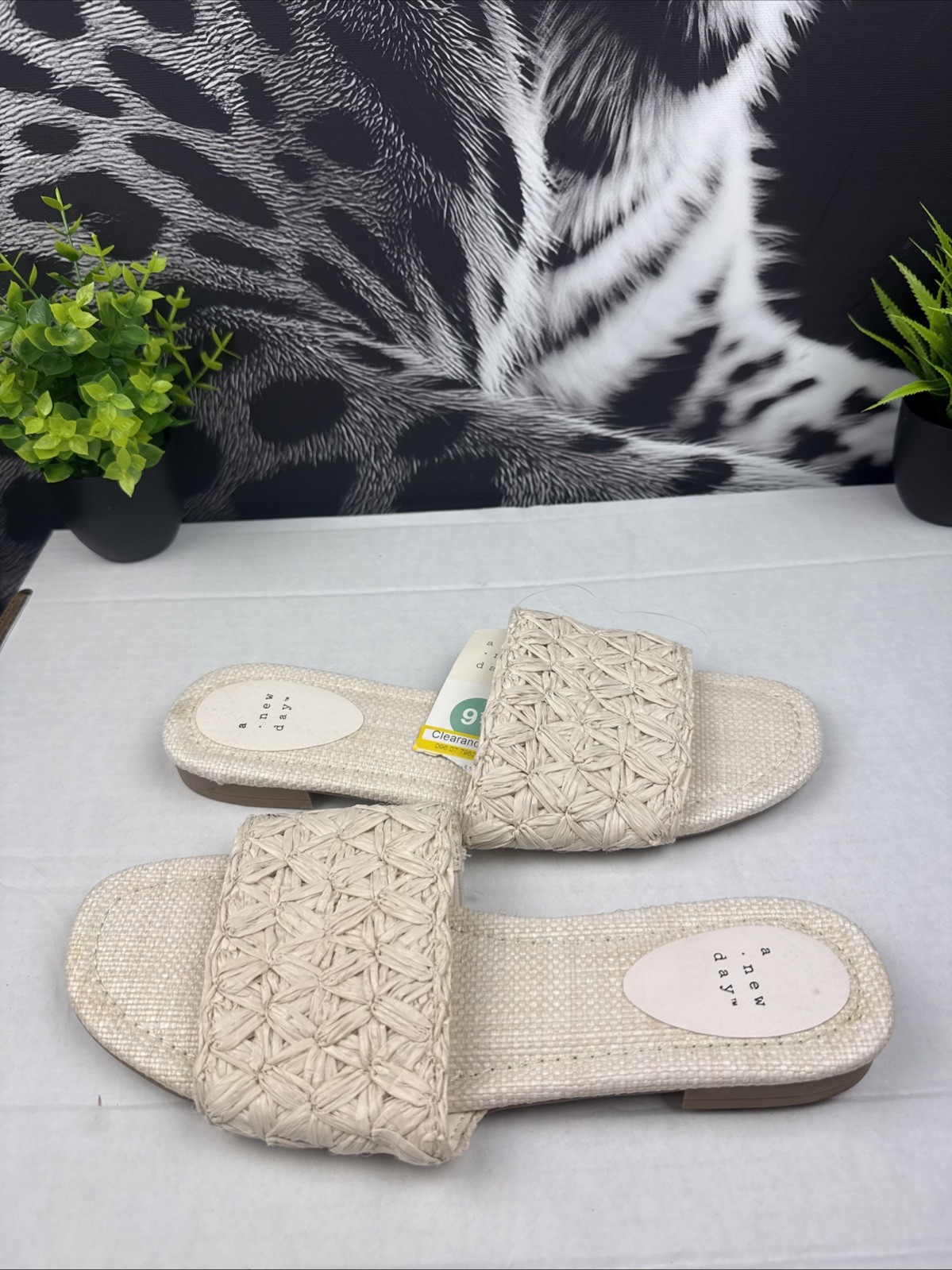 Step into effortless style and comfort with these beautiful woven slide sandals