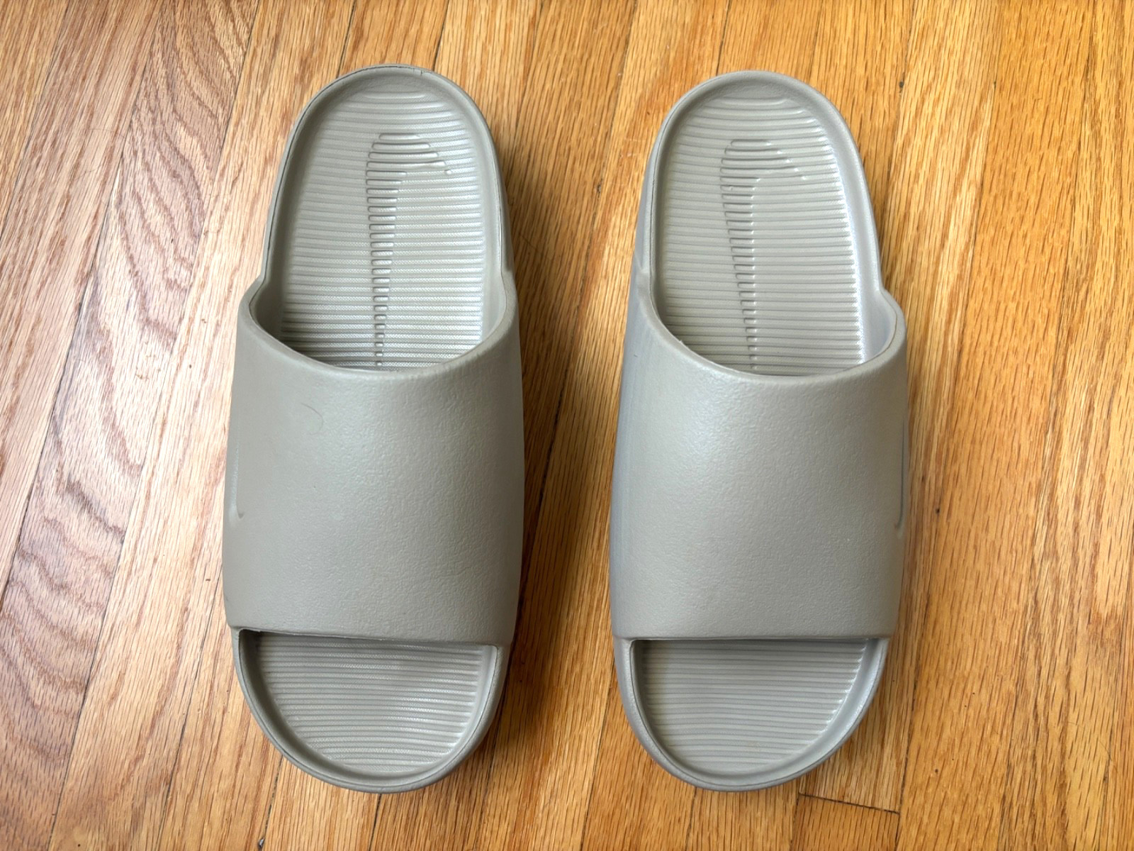Nike calm Slides Men Size 6 Women Size 7 Tan Used