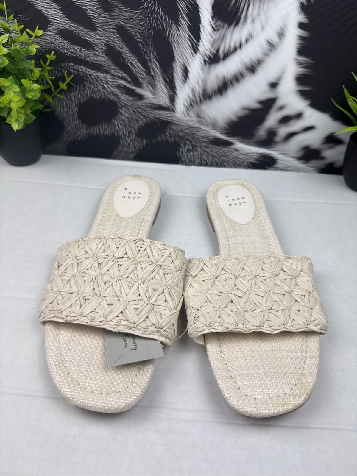 Step into effortless style and comfort with these beautiful woven slide sandals