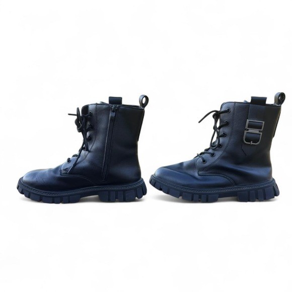Woman’s black punk boots