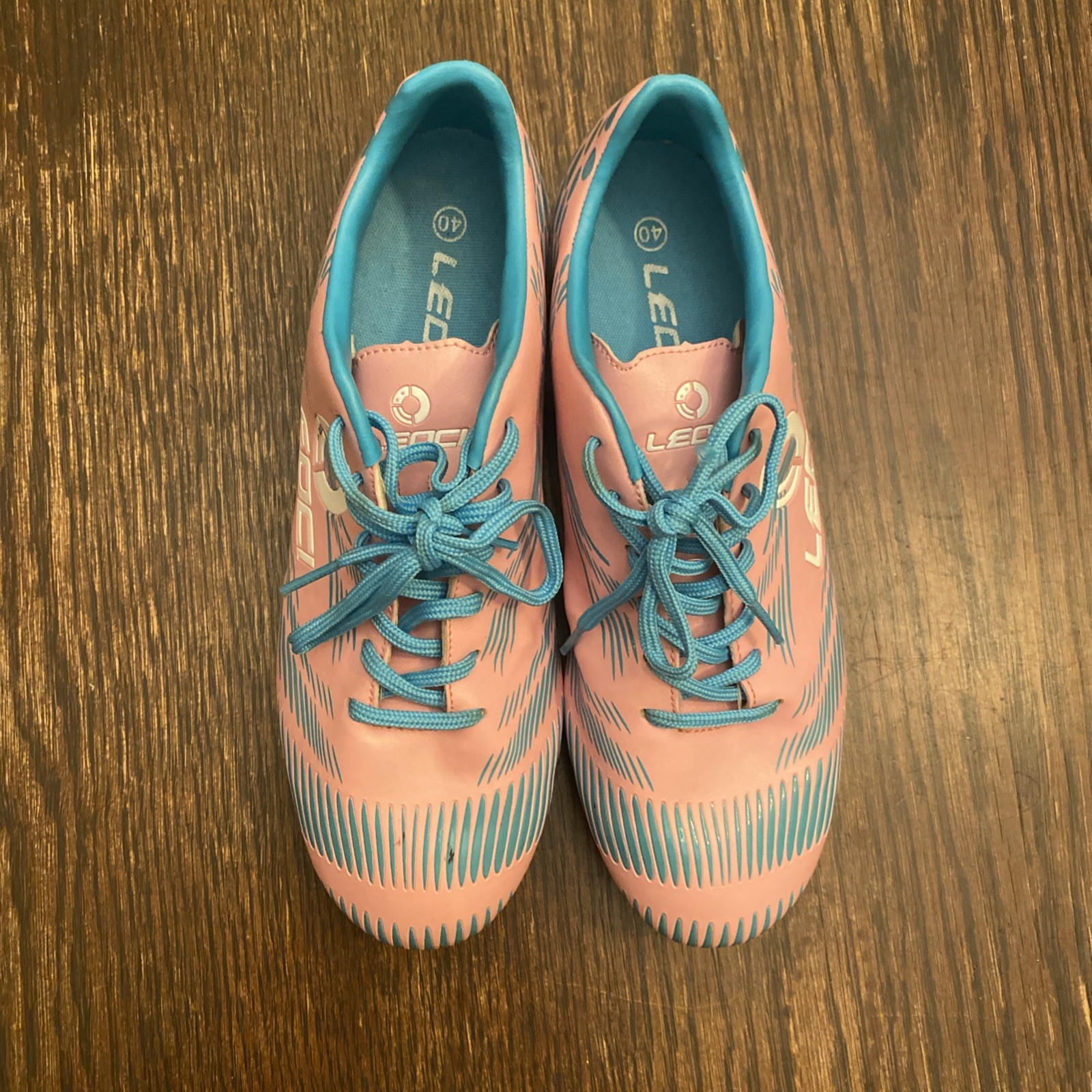 EUC Size 40 / Women’s 8.5-9 / Men’s 7 LEOCI Pink Blue Firm Ground Soccer Cleats