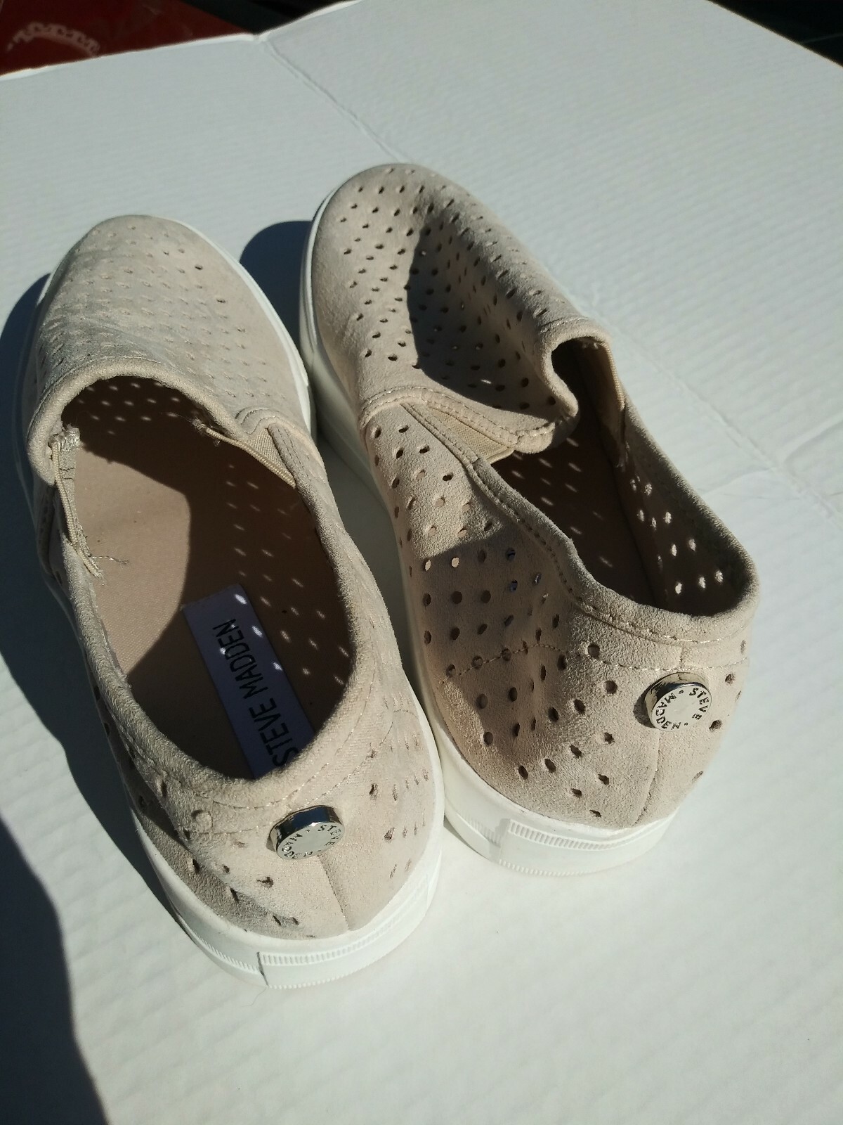 Steve Madden Owey perforated slip-on sneaker (Different Sizes – Left 7, Right 8)