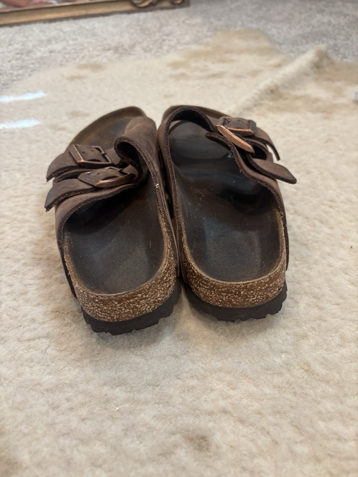 Size 37 Birkenstocks. Dark Colored With Gold Buckles.