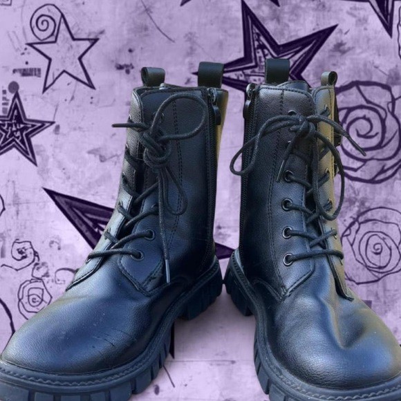 Woman’s black punk boots