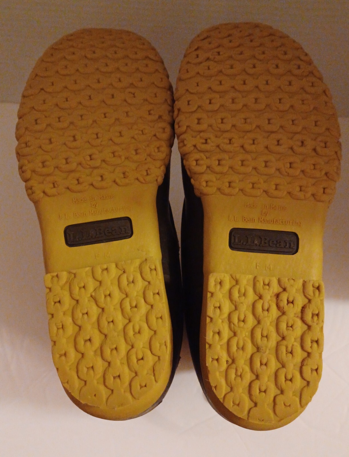 L.L. Bean Boots Duck Boots Feature A Lace Up Closure With Pull Tab On Back.